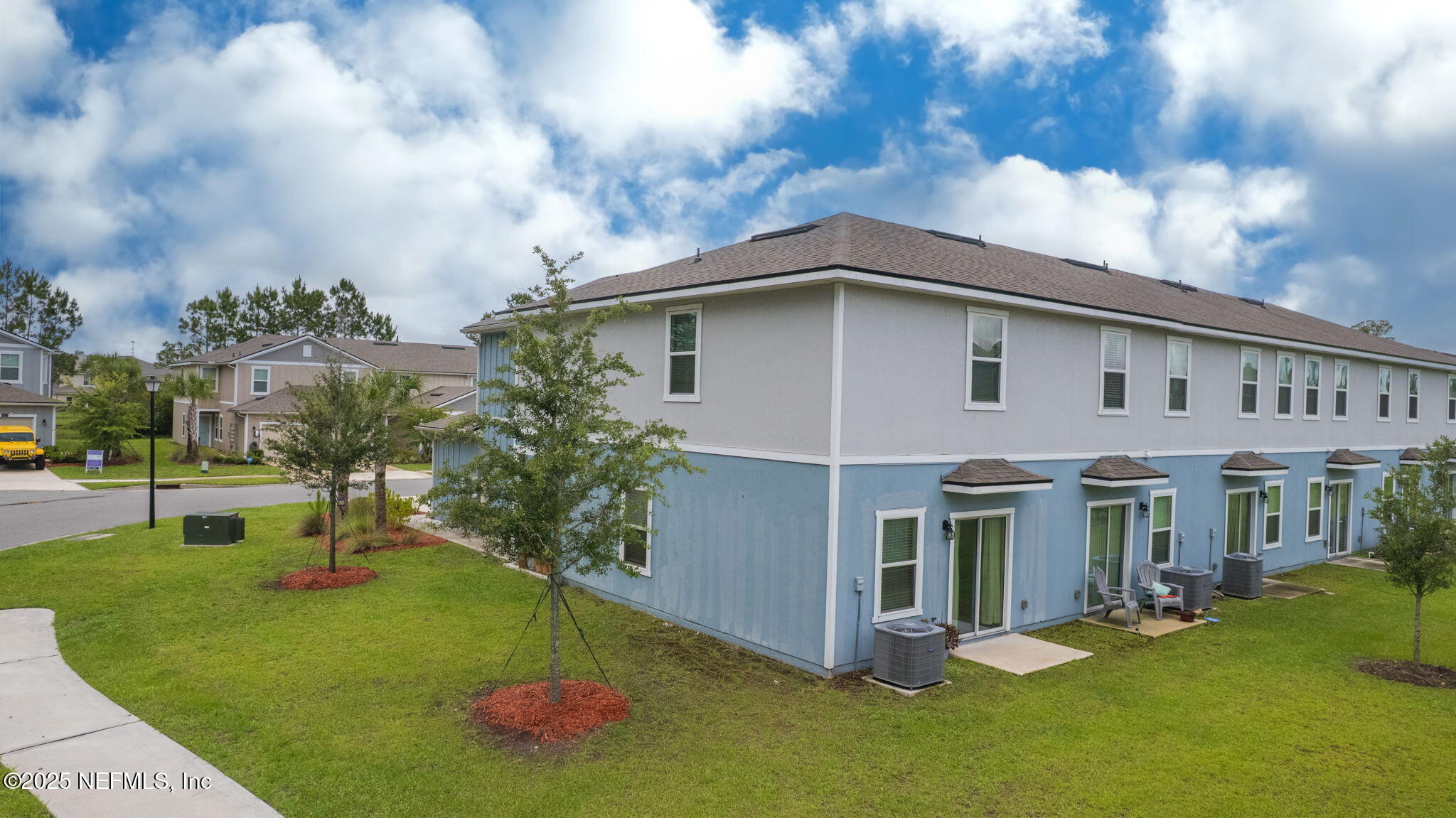 852 Capitol Parkway Jacksonville, FL 32218 - Photo 37 of 42 a front view of a house with a yard