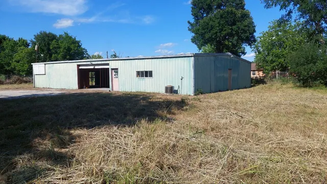a house view with a garden space