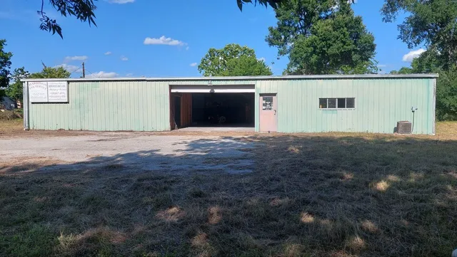 a view of backyard with green space
