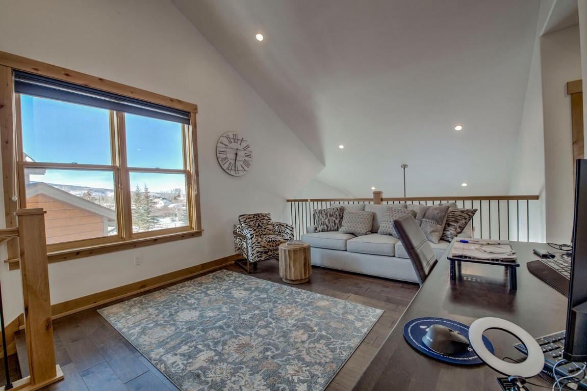28 Damselfly Loop Silverthorne, CO 80498 - Photo 25 of 45 a living room with furniture and a window