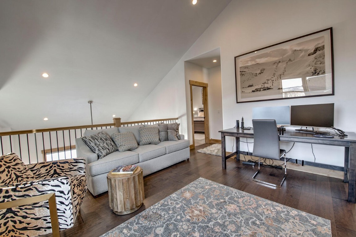 28 Damselfly Loop Silverthorne, CO 80498 - Photo 26 of 45 a living room with furniture and a flat screen tv