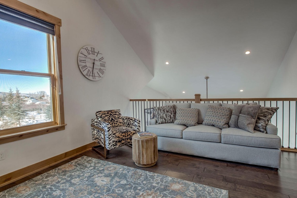 28 Damselfly Loop Silverthorne, CO 80498 - Photo 28 of 45 a living room with furniture and wooden floor