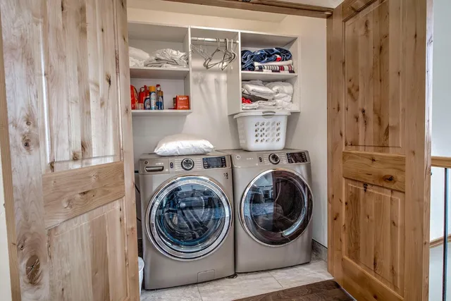 a utility room with dryer and washer