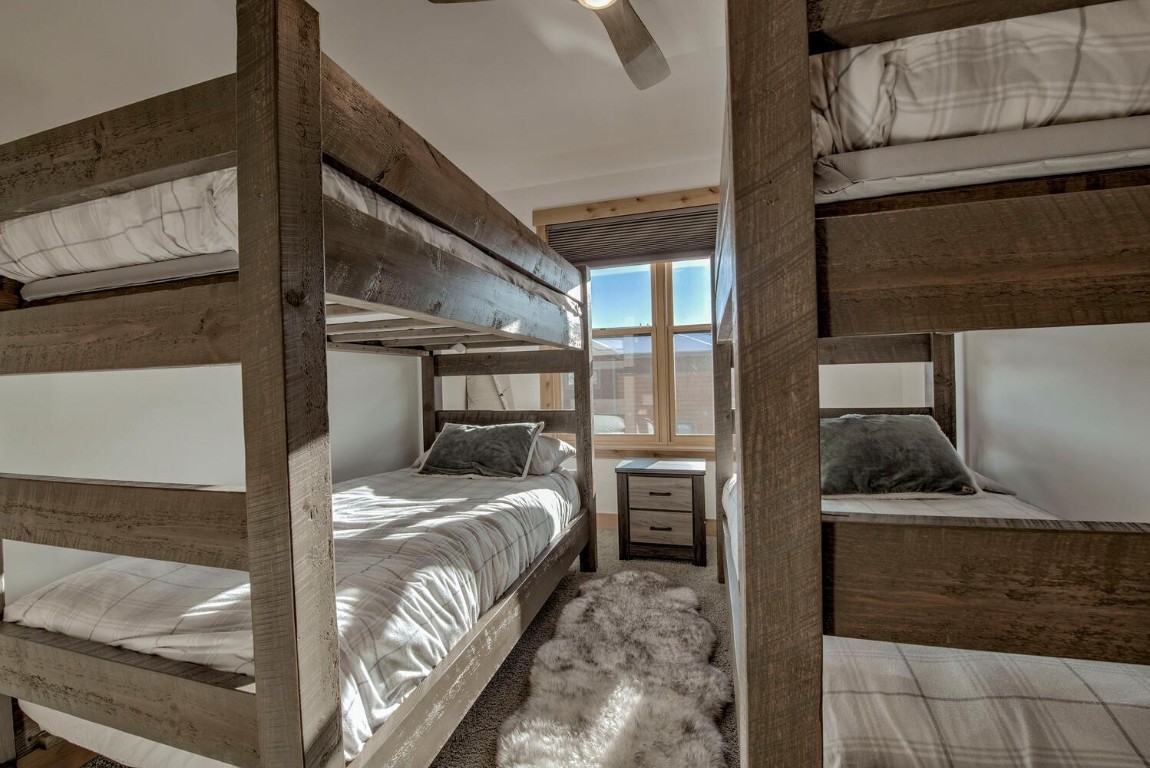 28 Damselfly Loop Silverthorne, CO 80498 - Photo 30 of 45 a bedroom with a bed and window