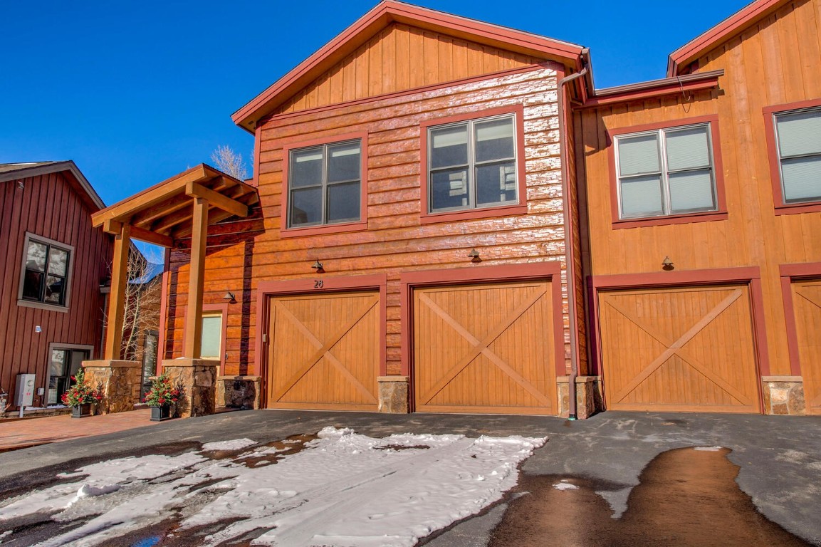28 Damselfly Loop Silverthorne, CO 80498 - Photo 43 of 45 a front view of a house with a garage