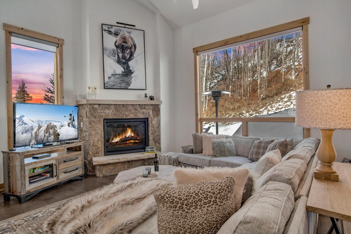 28 Damselfly Loop Silverthorne, CO 80498 - Photo 45 of 45 a living room with furniture a large window and a fireplace
