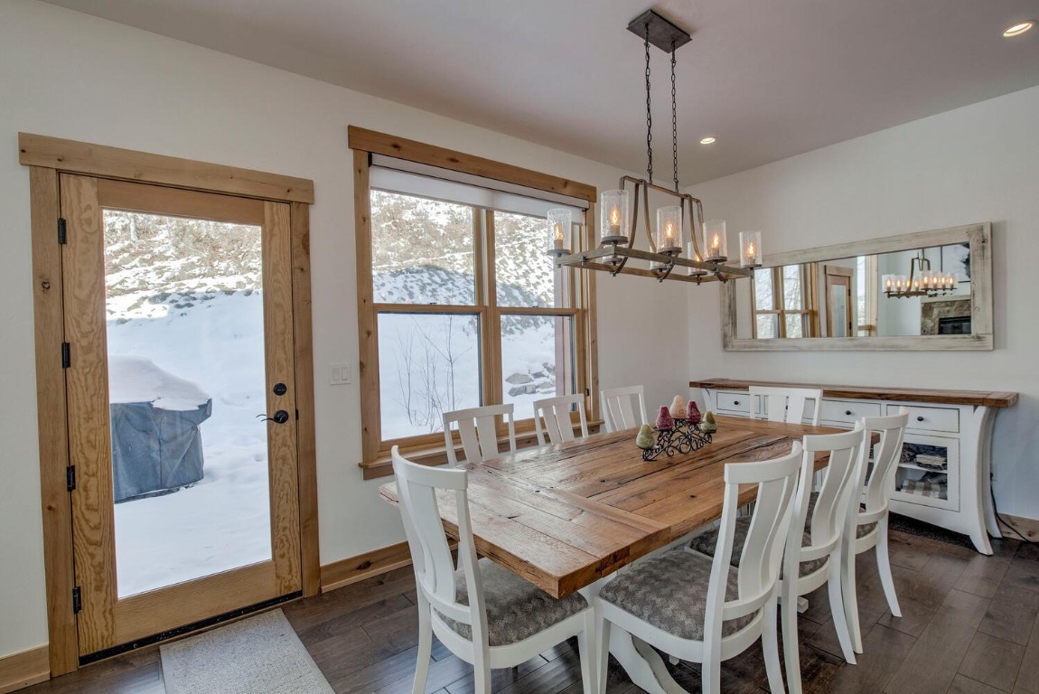 28 Damselfly Loop Silverthorne, CO 80498 - Photo 6 of 45 a view of a dining room with furniture window and outside view