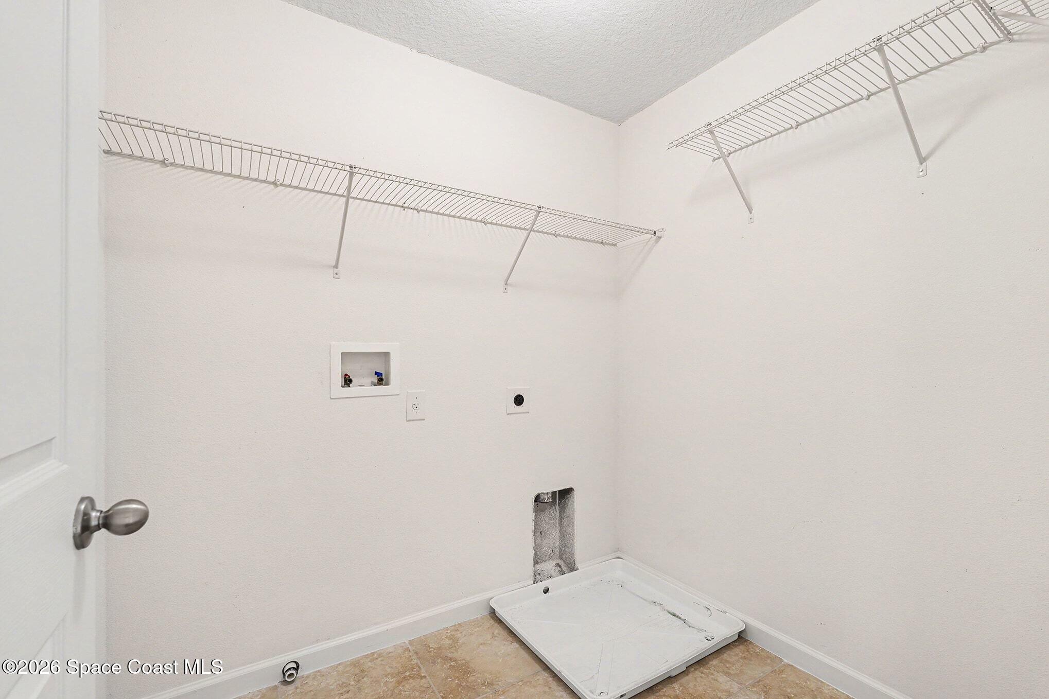 2535 Falcon Lane Mims, FL 32754 - Photo 15 of 31 a bathroom with a shower toilet and sink