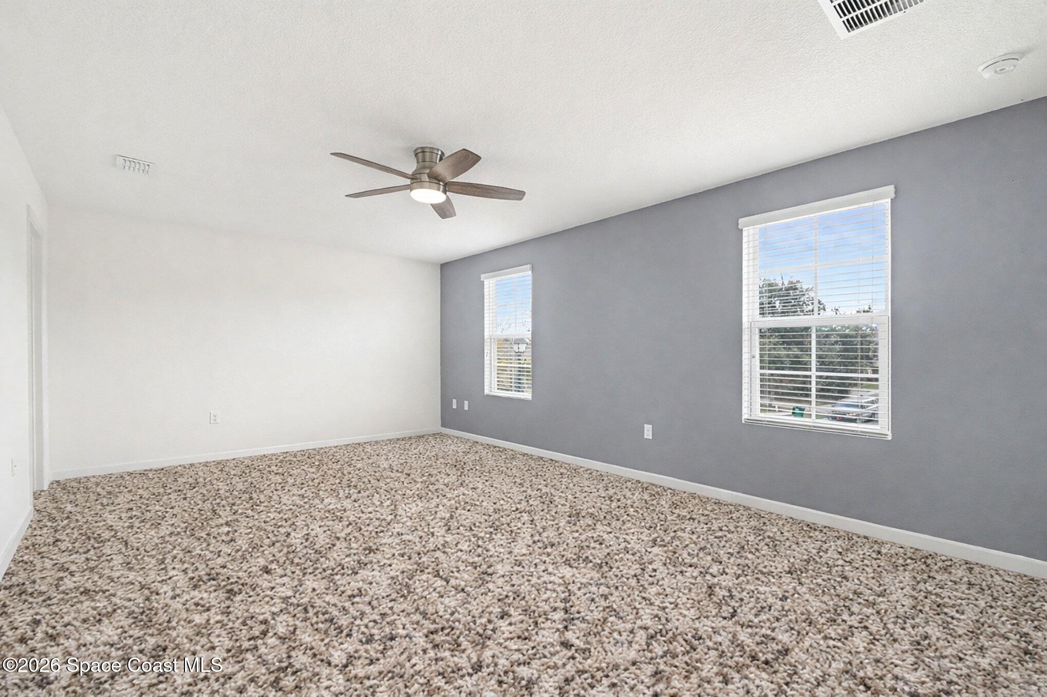 2535 Falcon Lane Mims, FL 32754 - Photo 16 of 31 a view of an empty room with a window