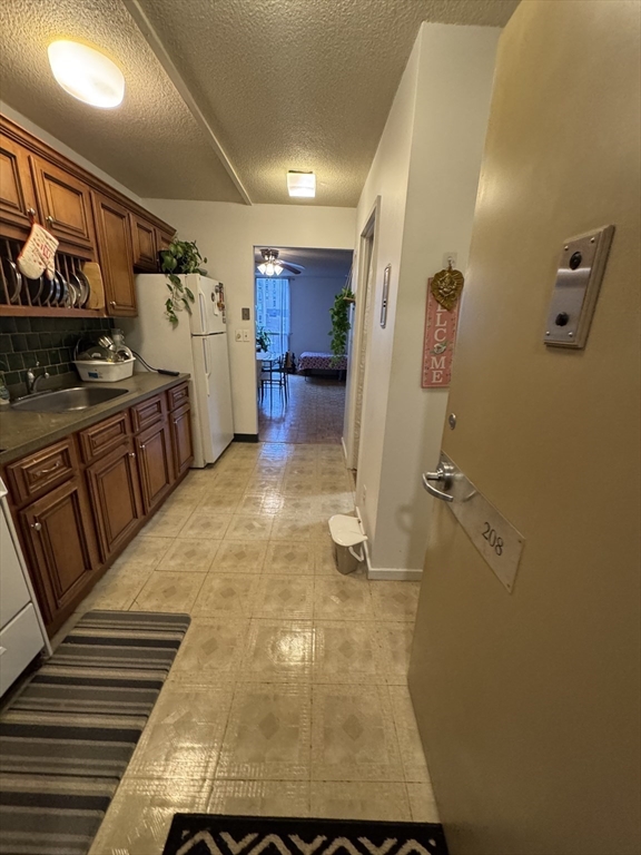 44 Washington Street, Unit 208 Brookline, MA 02445 - Photo 5 of 13 a view of a storage & utility room
