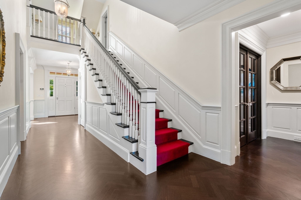 27 Pine Summit Circle, Unit 27 Weston, MA 02493 - Photo 25 of 42 a view of entryway and hall with wooden floor