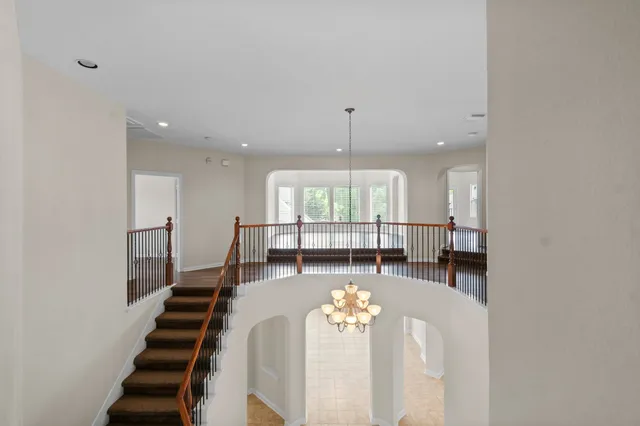 a lobby with furniture and window