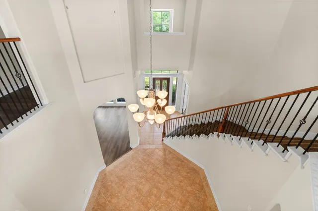 a view of an entryway with wooden floor