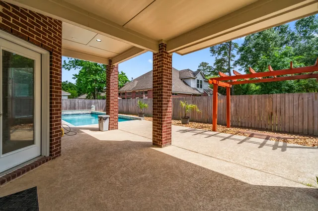 a outdoor view of a building with traffic signal lights