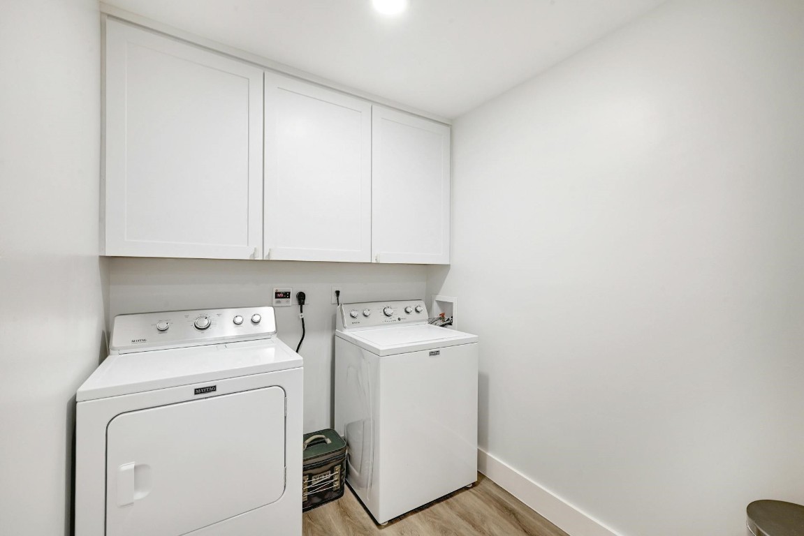 702 Castle Ridge Road, Unit B Austin, TX 78746 - Photo 20 of 23 a utility room with dryer and washer