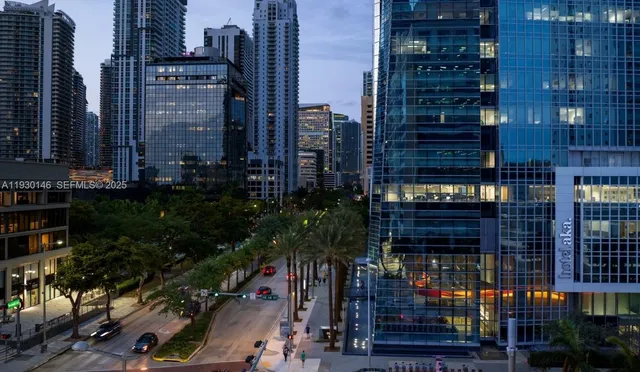 a view of a house with a tree