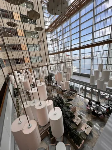 a living room with furniture window and a table