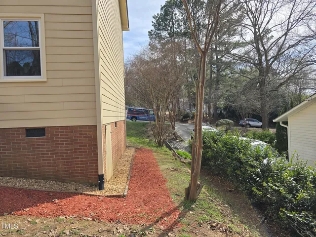 a view of backyard with trees
