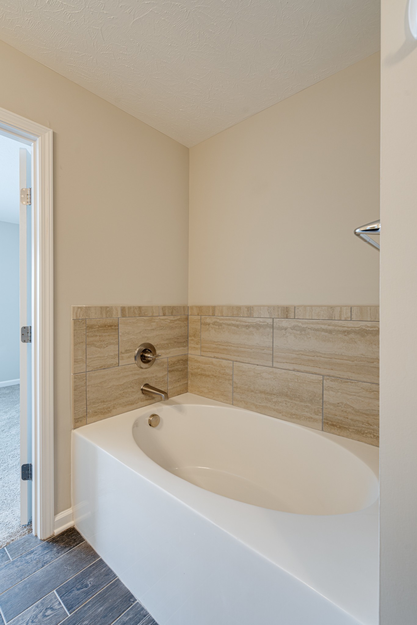 1382 Rural Hill Road, Unit 384 Antioch, TN 37013 - Photo 18 of 28 a bathroom with a bathtub and shower