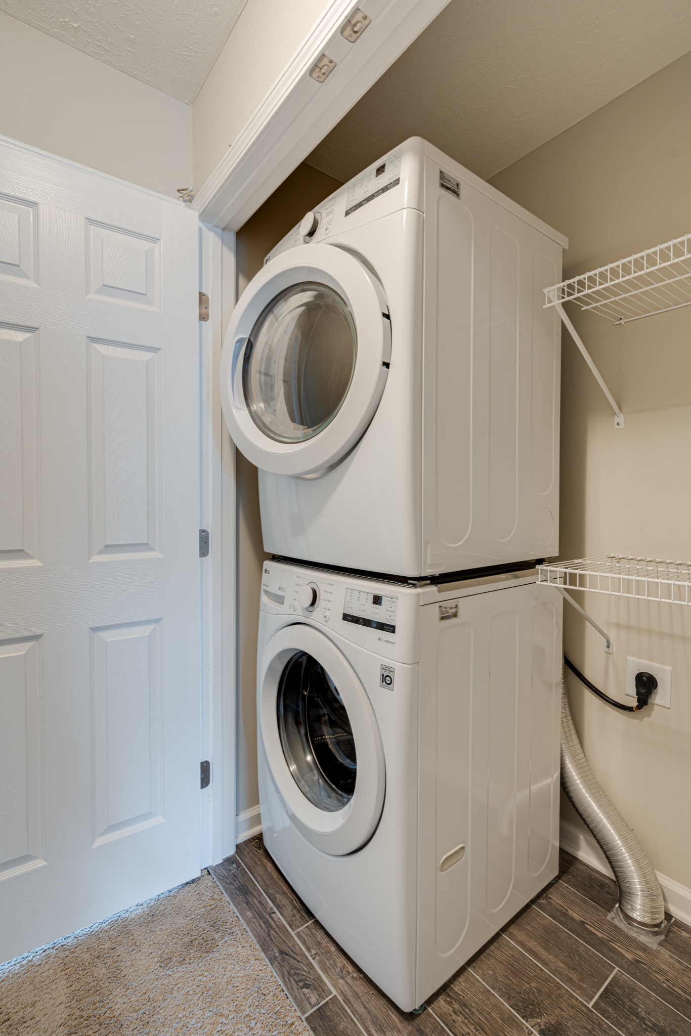 1382 Rural Hill Road, Unit 384 Antioch, TN 37013 - Photo 23 of 28 a utility room with dryer and washer