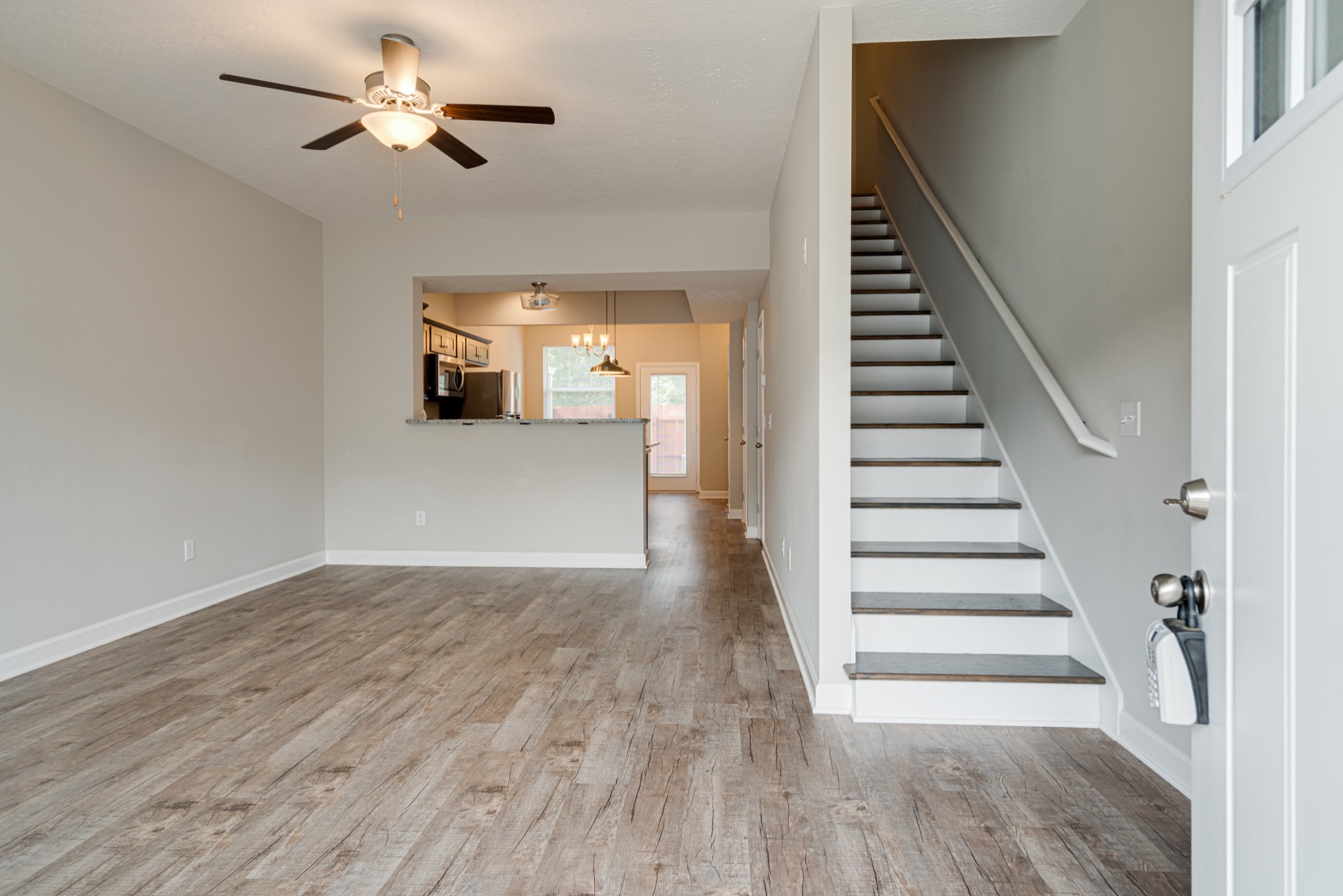 1382 Rural Hill Road, Unit 384 Antioch, TN 37013 - Photo 6 of 28 a view of entryway and hall with wooden floor