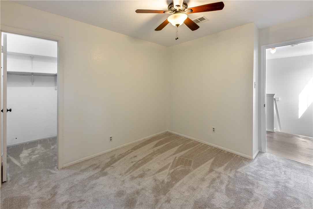 12702 Rhea Court Austin, TX 78727 - Photo 15 of 19 Bedroom 2 with walk in closet