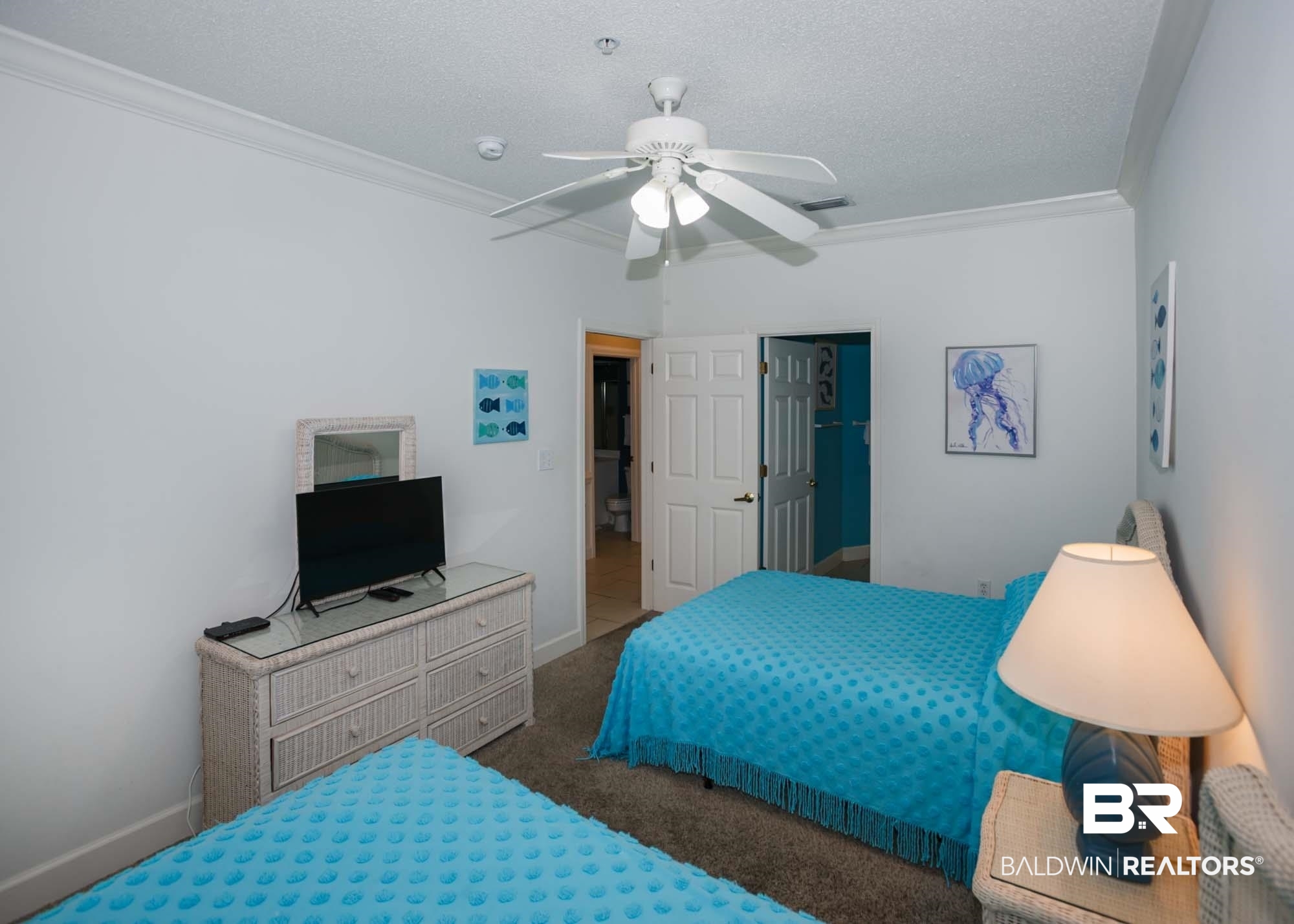 28910 Perdido Beach Boulevard, Unit 4B Orange Beach, AL 36561 - Photo 34 of 48 Bedroom with ornamental molding, a textured ceiling, baseboards, and visible vents