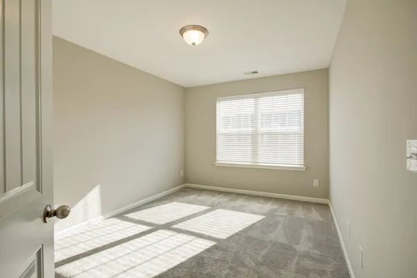 a view of a room with a window
