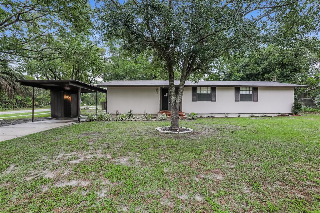 1 Estrella Road DeBary, FL 32713 - Photo 1 of 1 a front view of house with yard