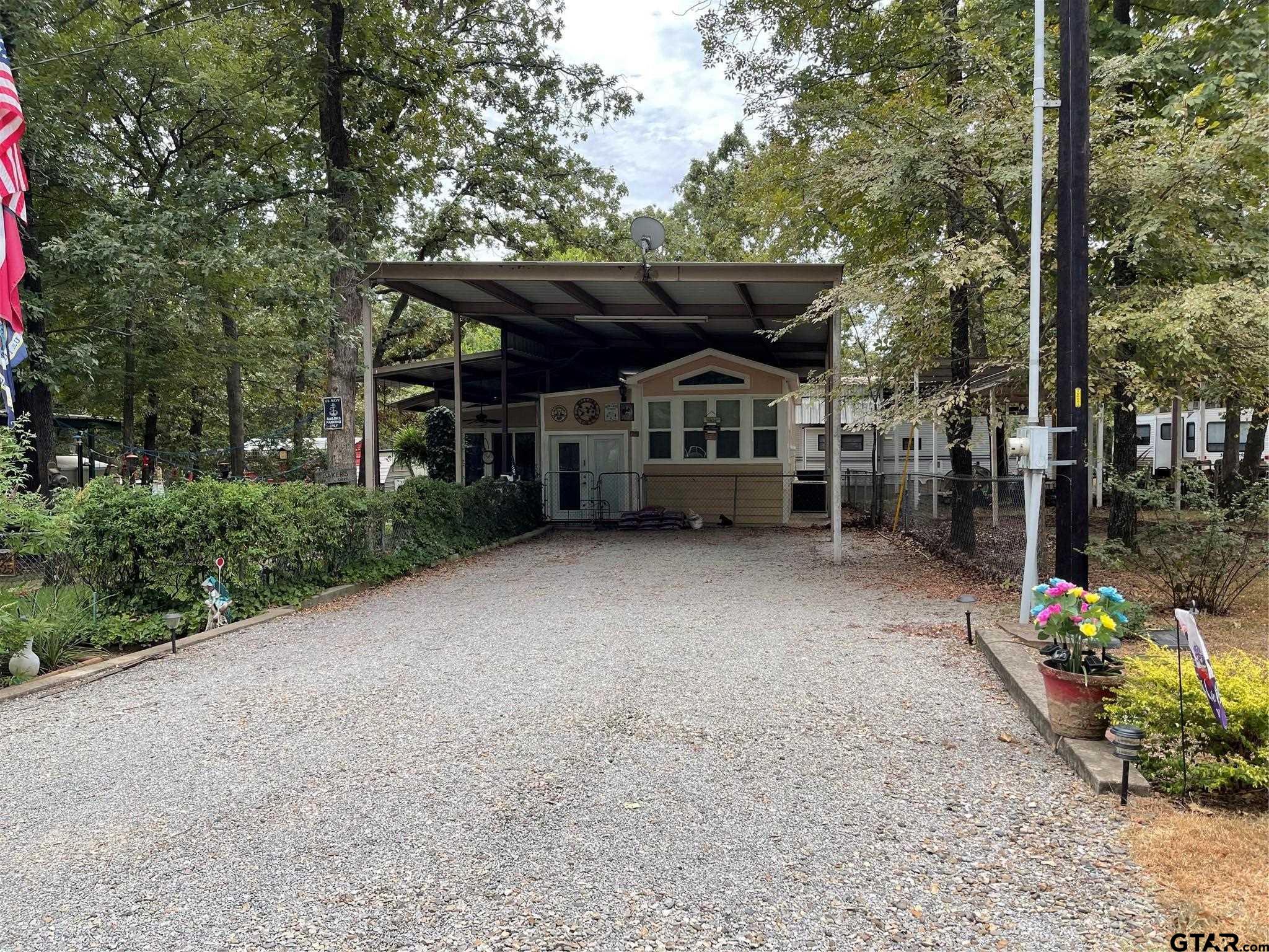 6435 FM 17 Yantis, TX 75497 - Photo 1 of 23 a view of a house with a backyard and sitting area