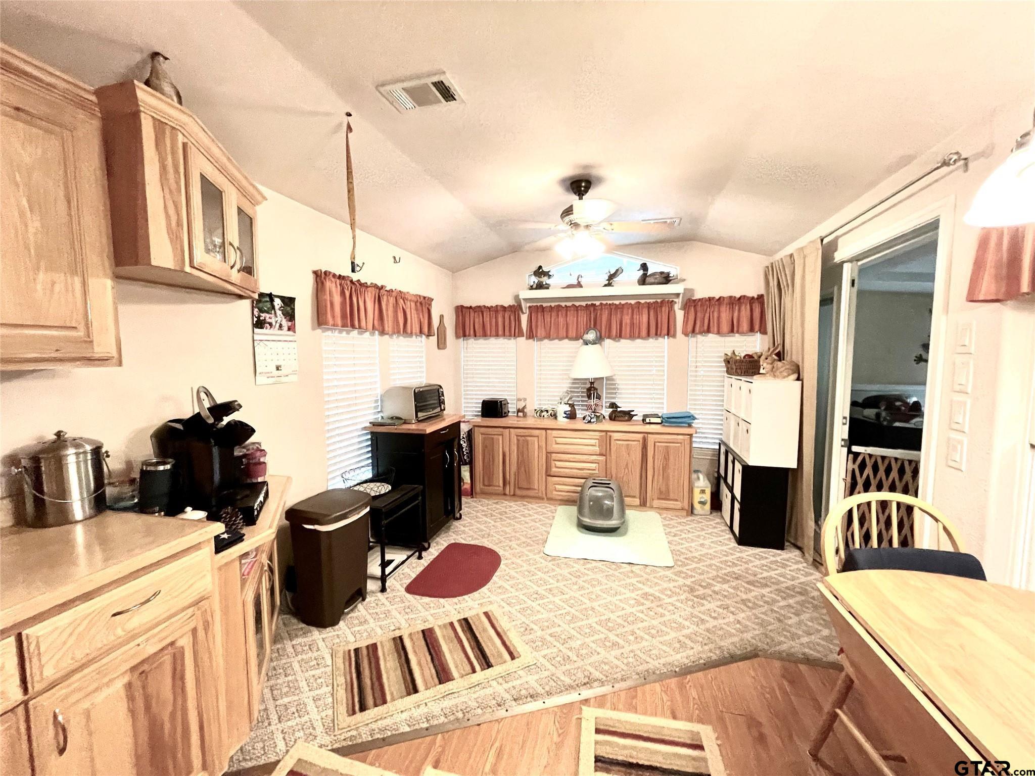 6435 FM 17 Yantis, TX 75497 - Photo 18 of 23 a kitchen with a stove and a refrigerator