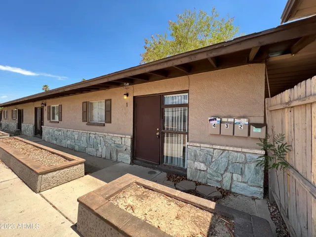 a view of balcony with furniture