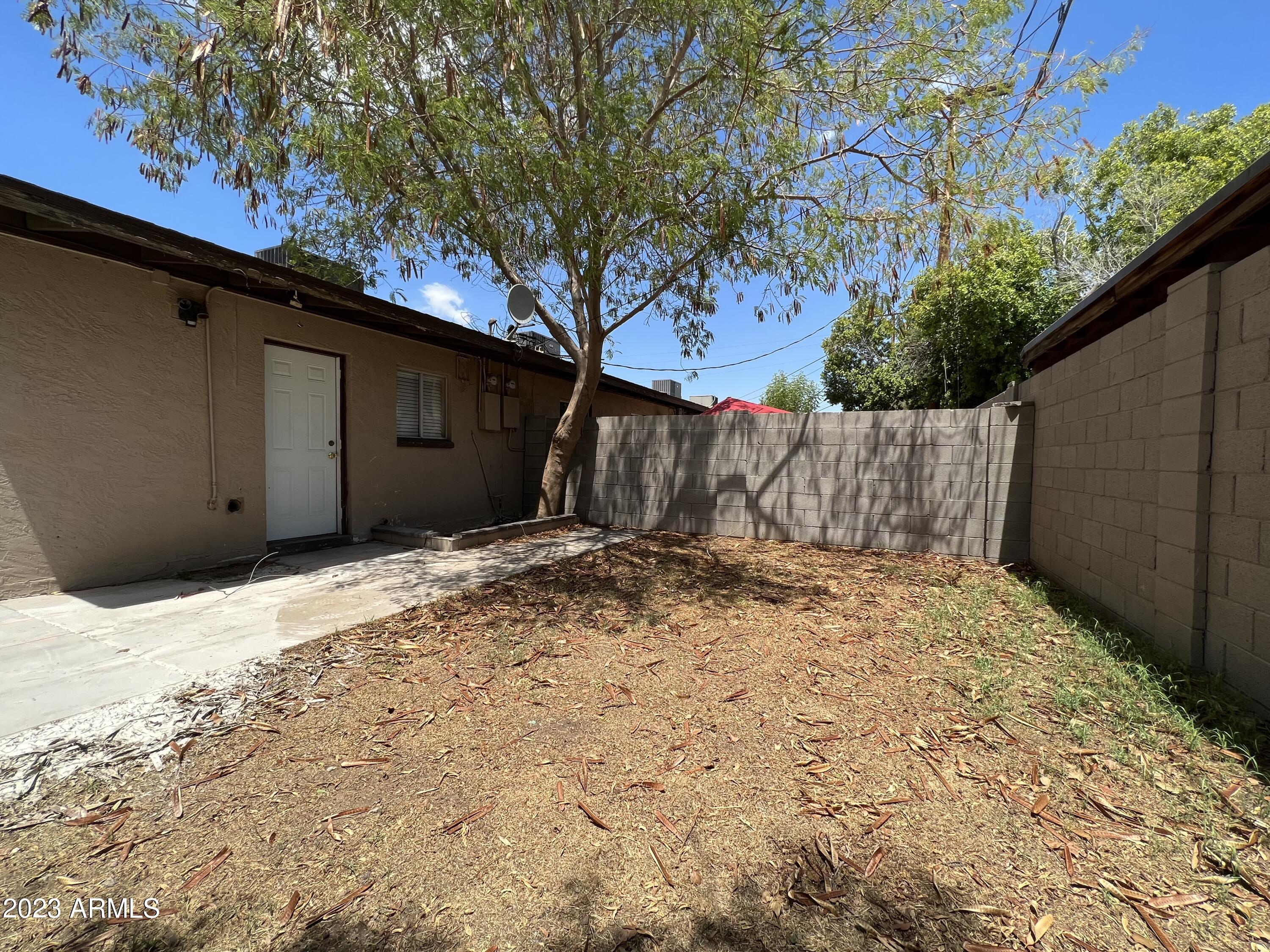 26 West 6th Place, Unit 3 Mesa, AZ 85201 - Photo 11 of 11 a view of a backyard of the house