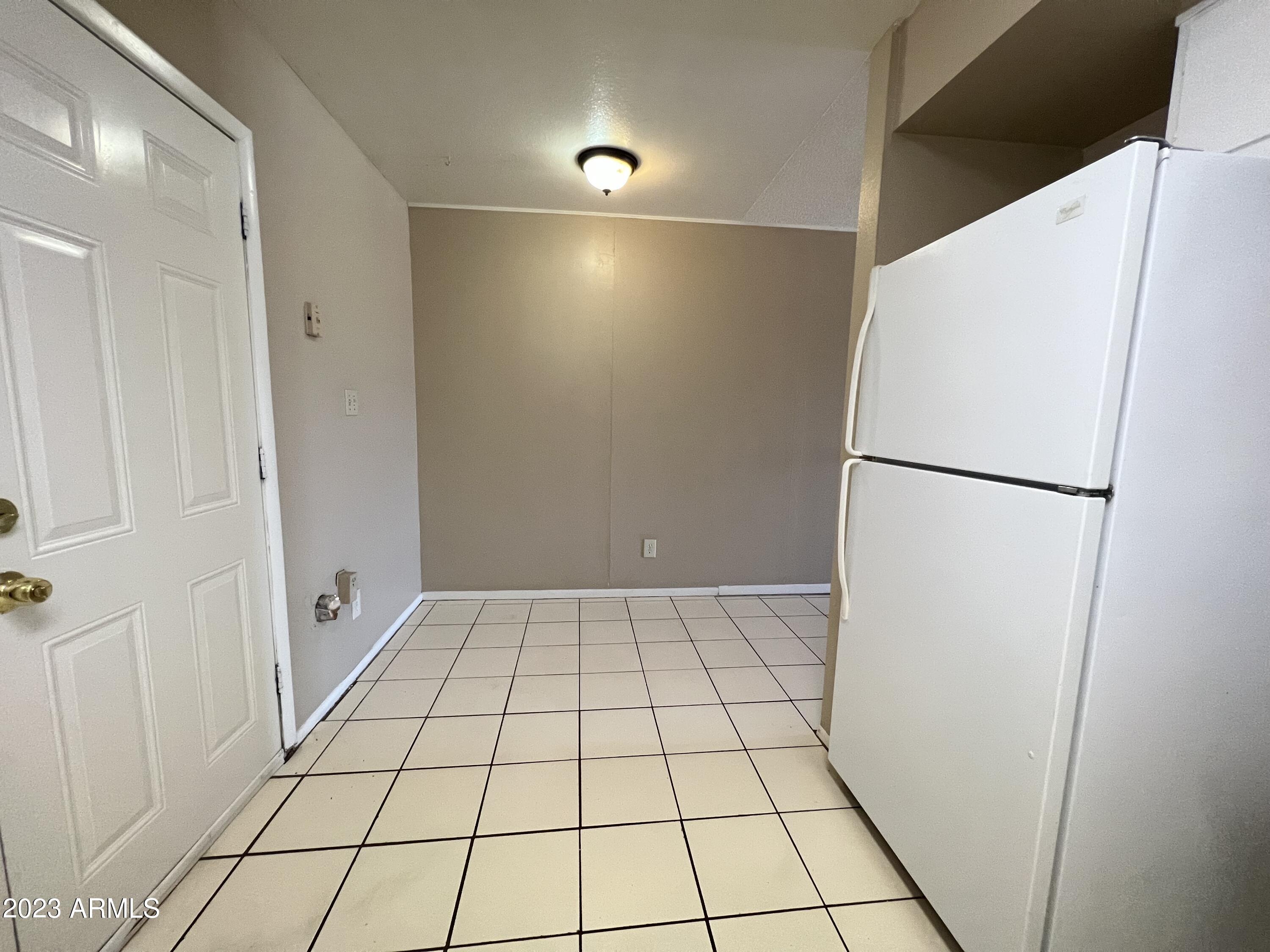 26 West 6th Place, Unit 3 Mesa, AZ 85201 - Photo 7 of 11 a view of an empty room