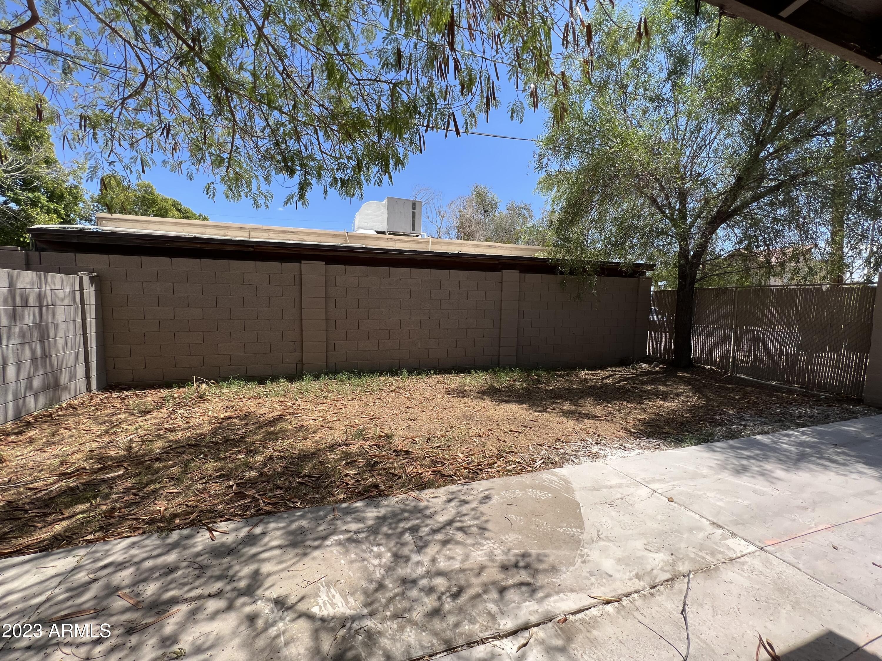 26 West 6th Place, Unit 3 Mesa, AZ 85201 - Photo 10 of 11 a front view of a house