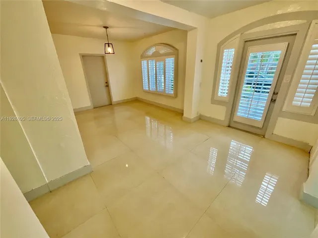 an empty room with windows