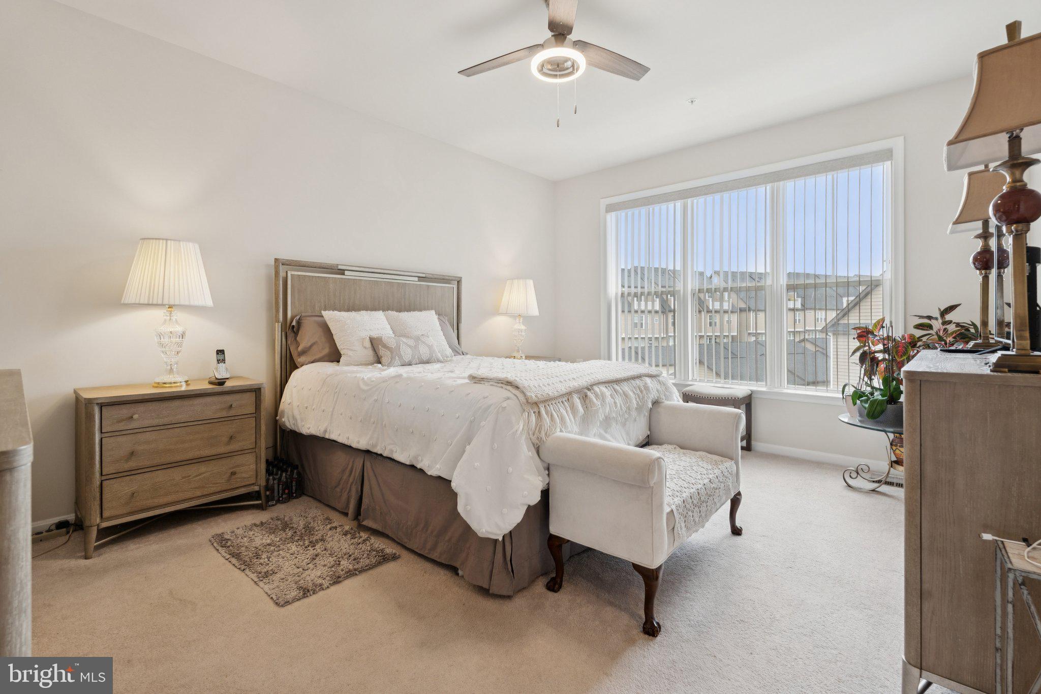 969 Holden Road Frederick, MD 21701 - Photo 11 of 35 a bed room with a bed and a couch