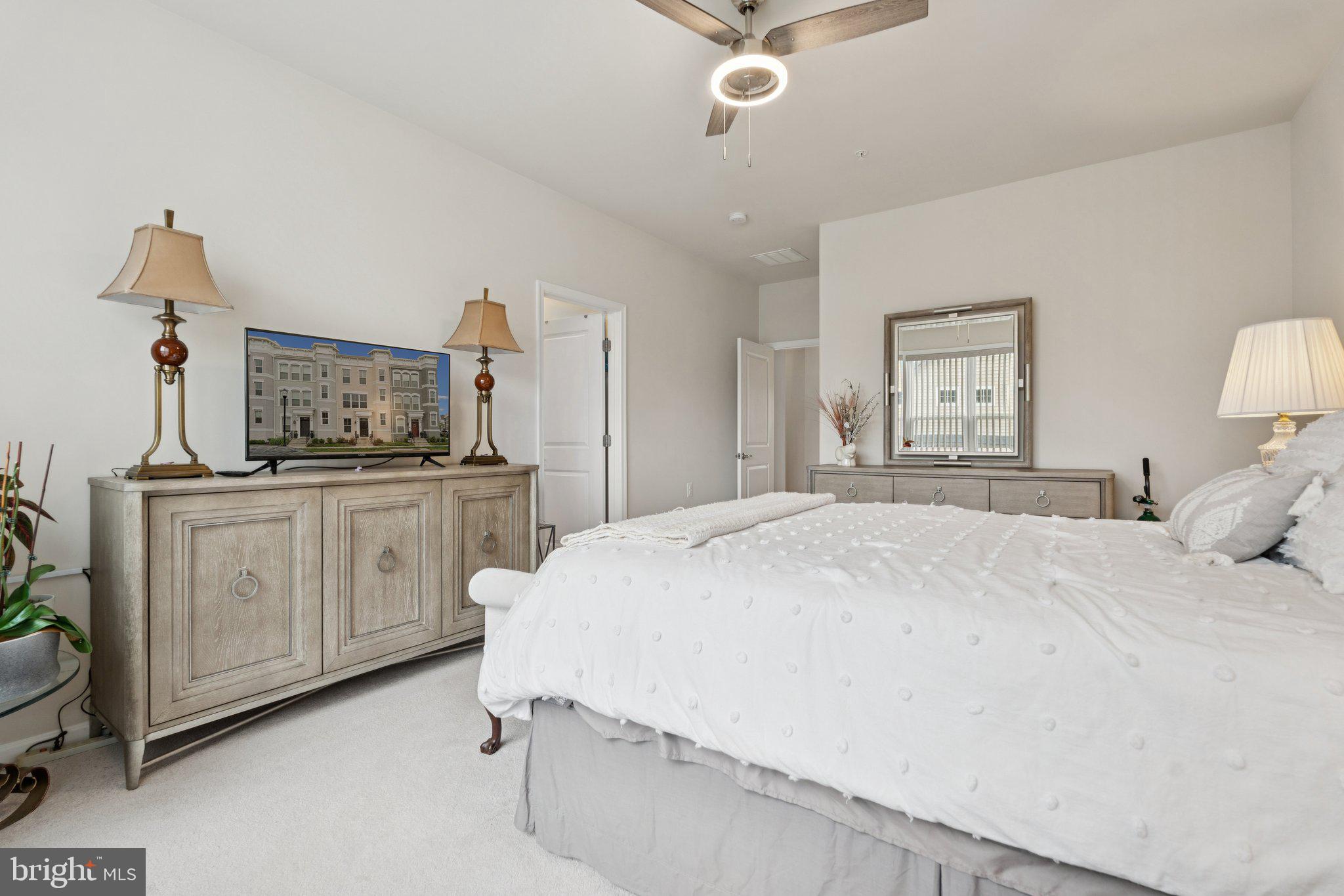 969 Holden Road Frederick, MD 21701 - Photo 14 of 35 a bedroom with a bed and dresser