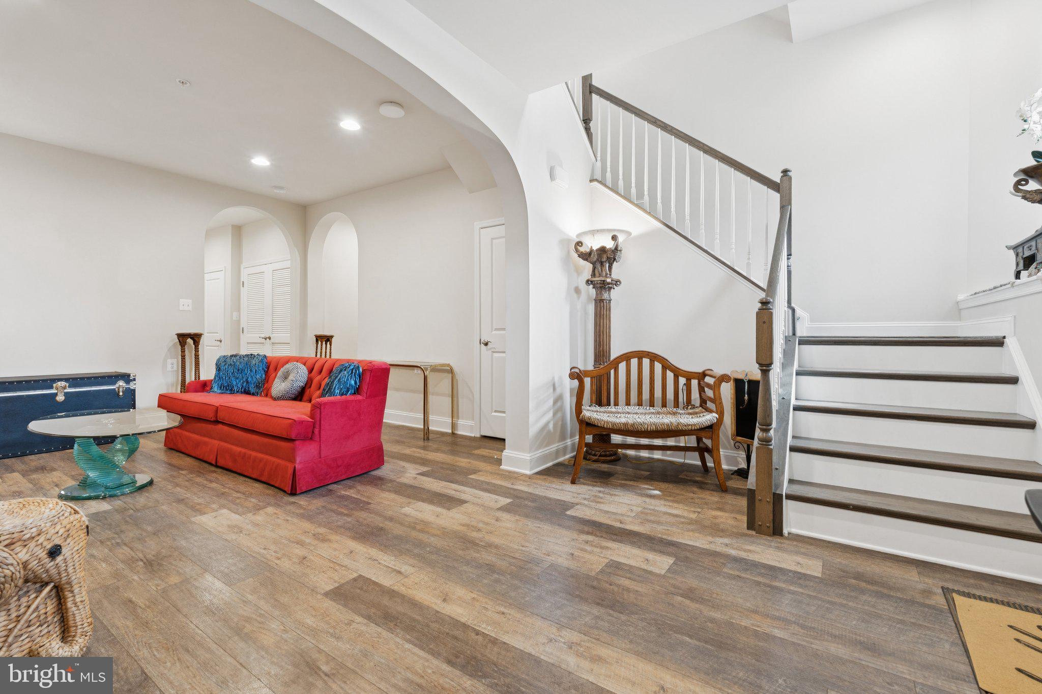 969 Holden Road Frederick, MD 21701 - Photo 15 of 35 a spacious bedroom with a bed and a chair