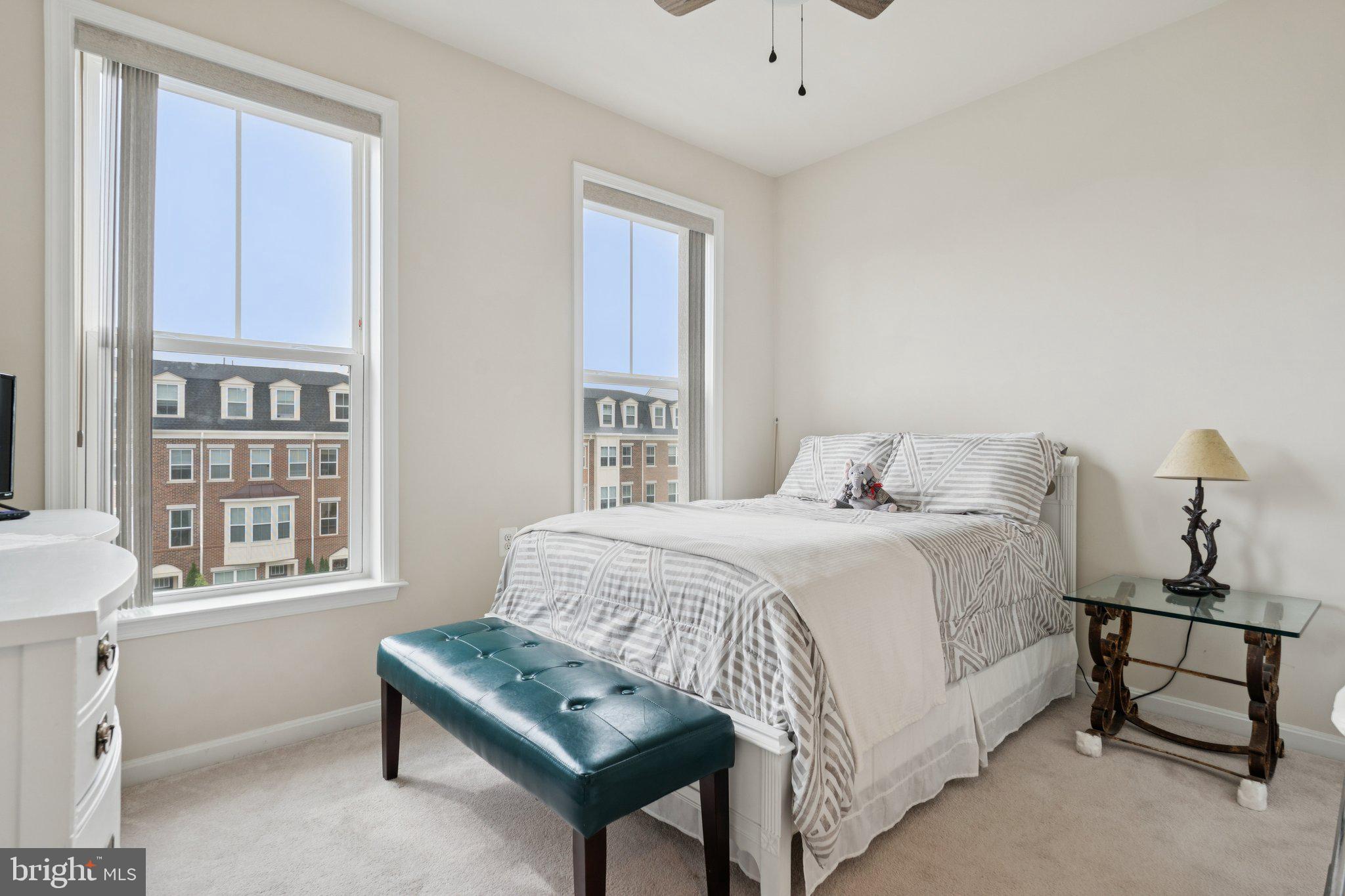 969 Holden Road Frederick, MD 21701 - Photo 19 of 35 a bedroom with a bed window and table chair