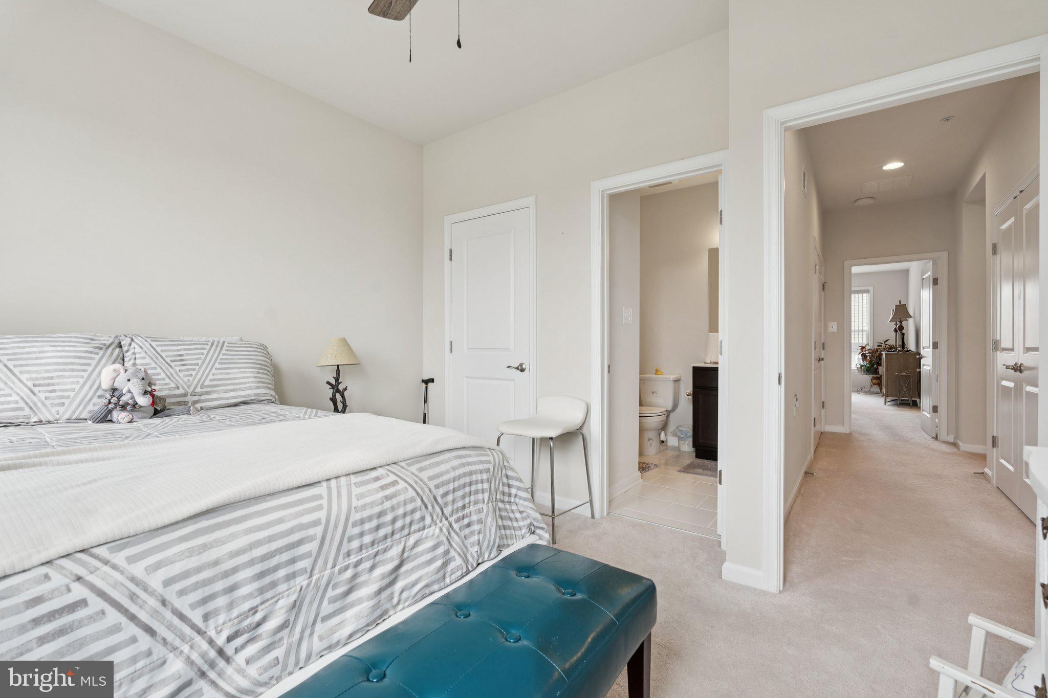 969 Holden Road Frederick, MD 21701 - Photo 20 of 35 a bedroom with a bed and a mirror