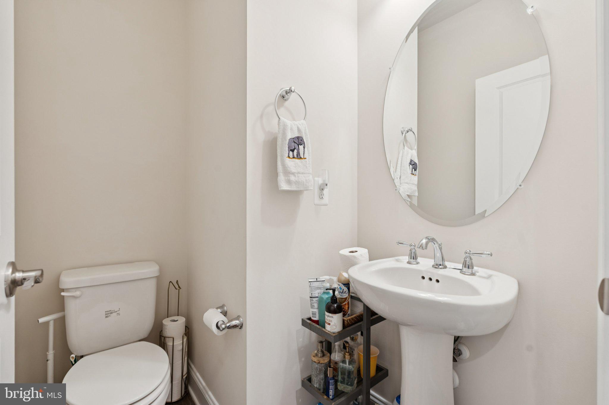 969 Holden Road Frederick, MD 21701 - Photo 24 of 35 a bathroom with a toilet sink and mirror