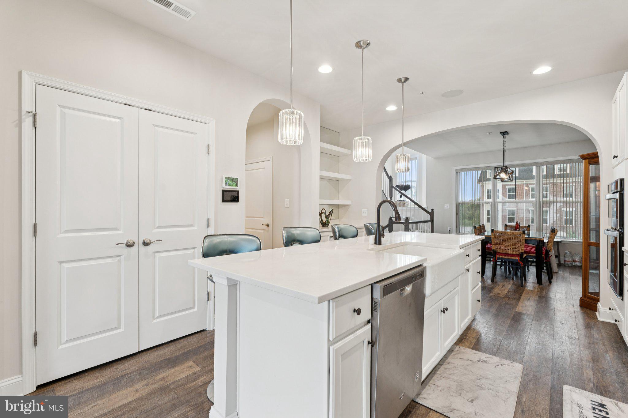 969 Holden Road Frederick, MD 21701 - Photo 5 of 35 a large room with lots of counter space and chandelier