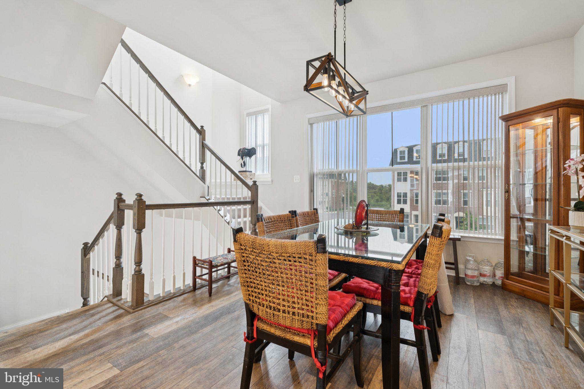 969 Holden Road Frederick, MD 21701 - Photo 6 of 35 a view of a dining room with furniture window and wooden floor
