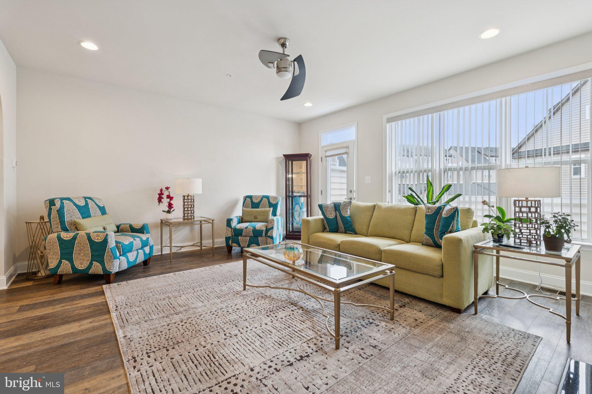 969 Holden Road Frederick, MD 21701 - Photo 8 of 35 a living room with furniture and a wooden floor