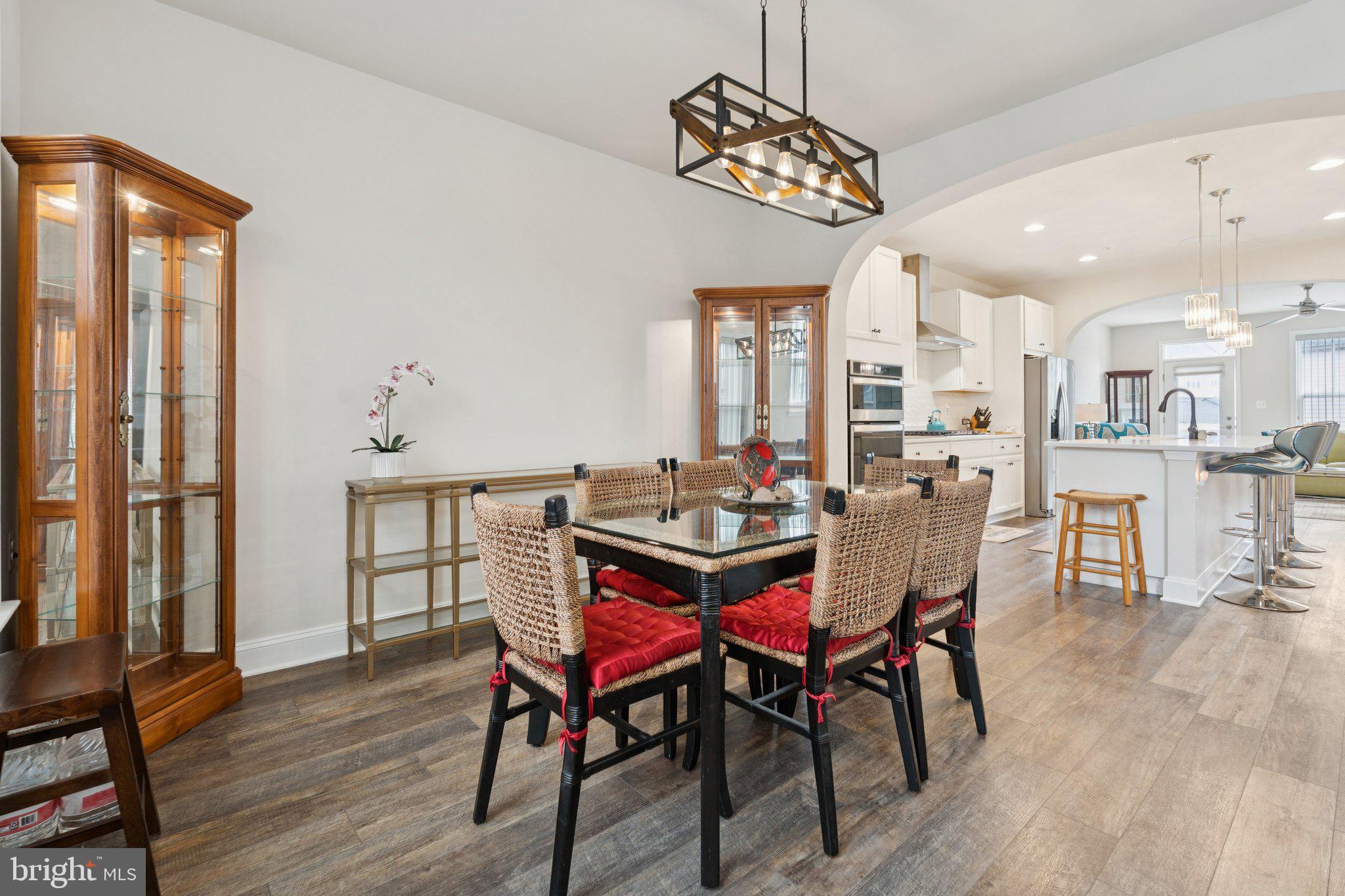 969 Holden Road Frederick, MD 21701 - Photo 9 of 35 a view of a dining room with furniture window and wooden floor