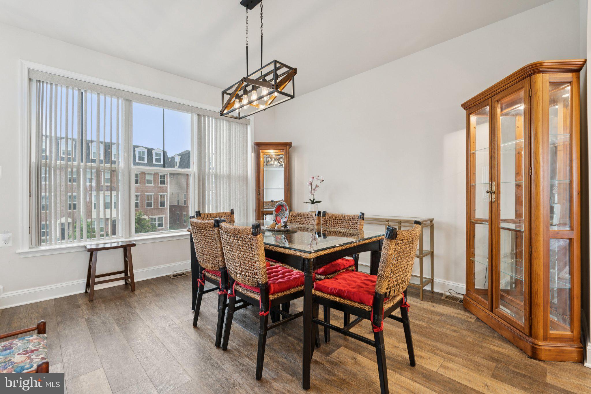 969 Holden Road Frederick, MD 21701 - Photo 10 of 35 a view of a dining room with furniture window and wooden floor