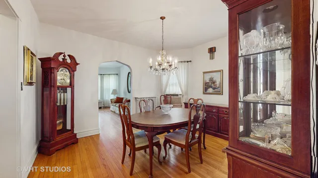 a view of a dining room with furniture and window