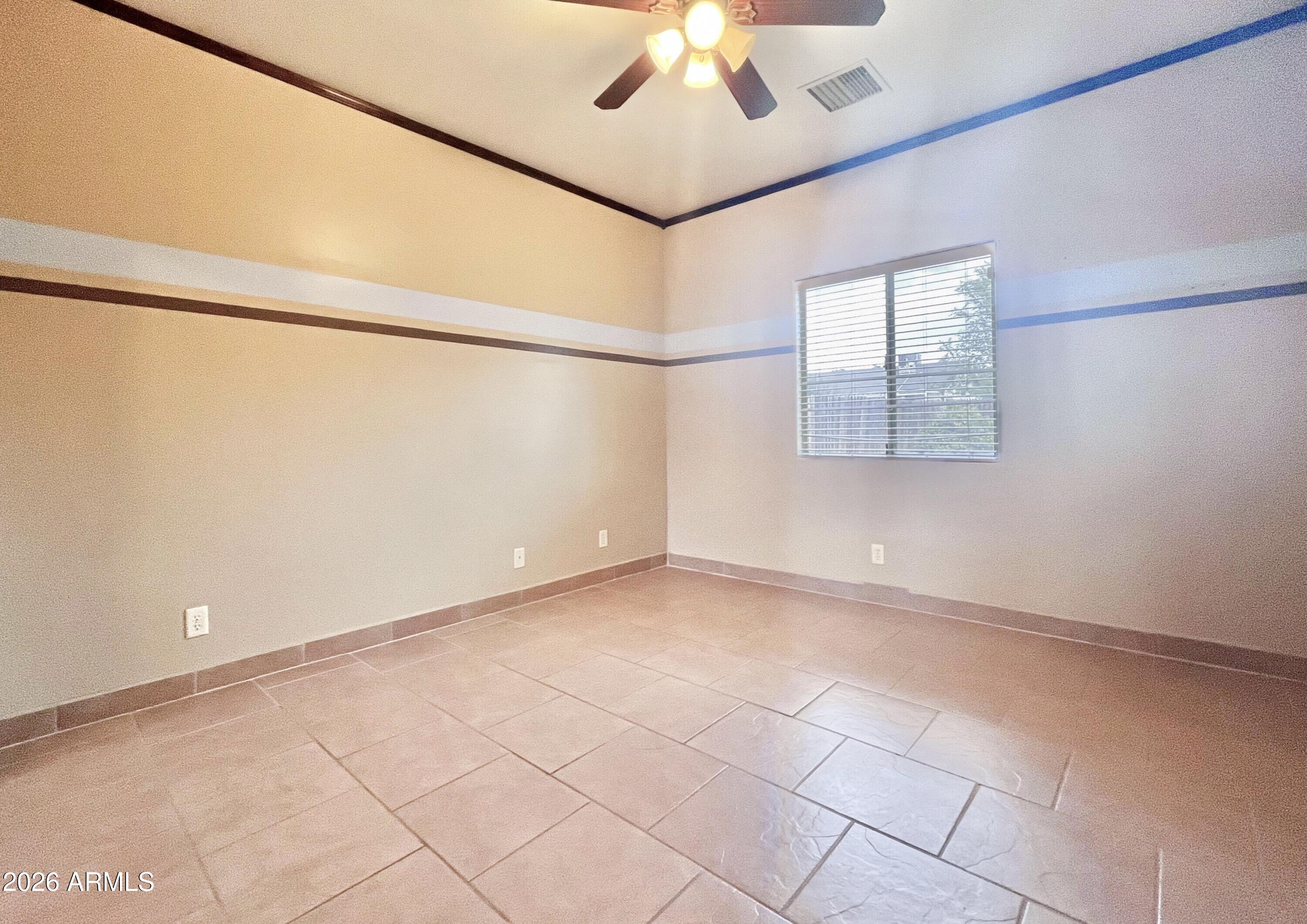 5655 North Laura Lane Rimrock, AZ 86335 - Photo 20 of 37 a view of an empty room with a window