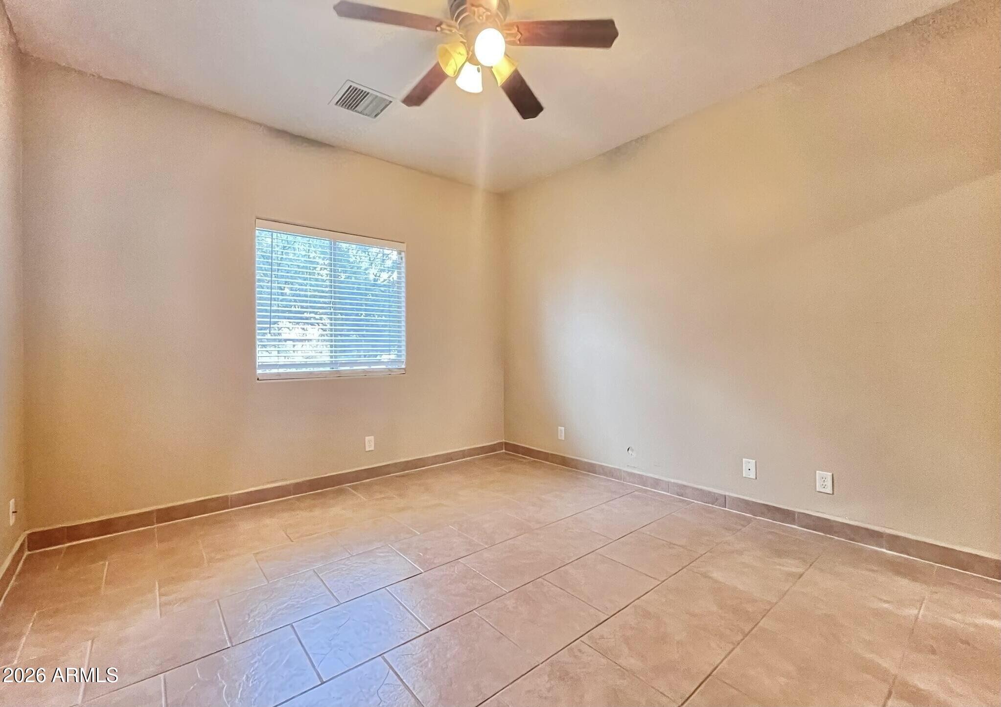 5655 North Laura Lane Rimrock, AZ 86335 - Photo 24 of 37 a view of an empty room with a window